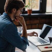 Man Working on Laptop